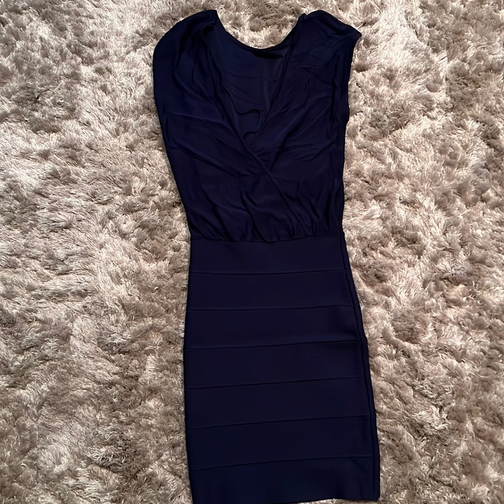 Navy blue BCBG body con dress. Looks great On really accentuates your curves